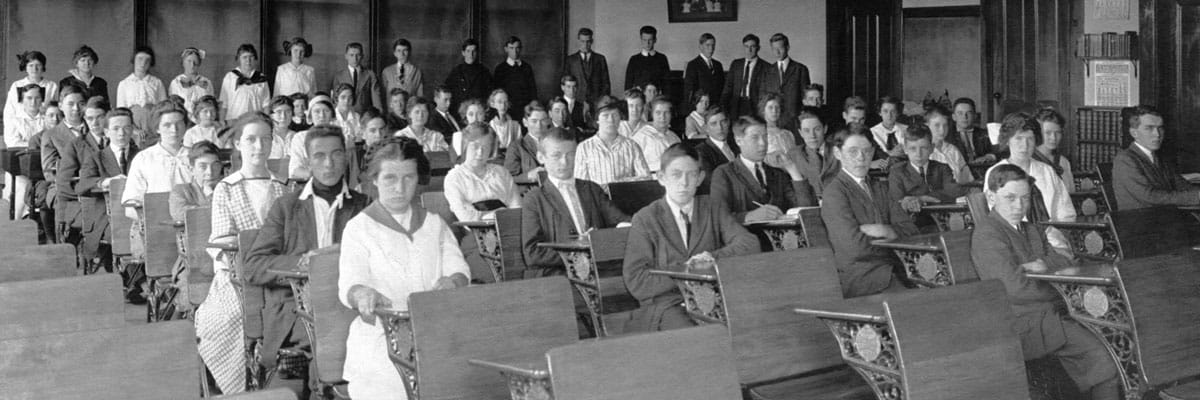Old Photo of Students Sitting in Class in Black and White