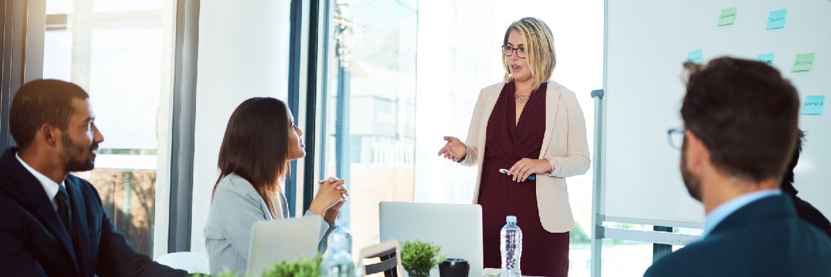 A Woman Giving a Talk to a Group of People