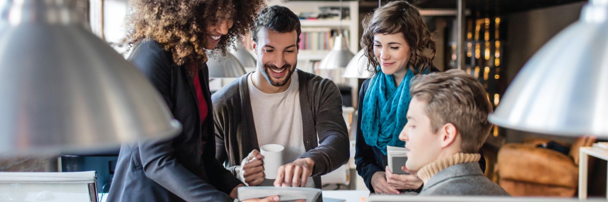 Group of Young Friends Meeting Over Coffee