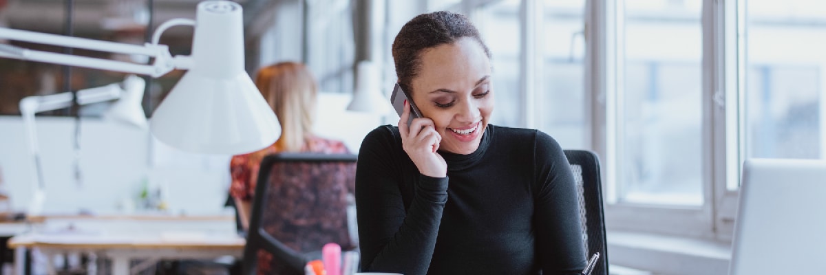Woman on Cellphone Smiling