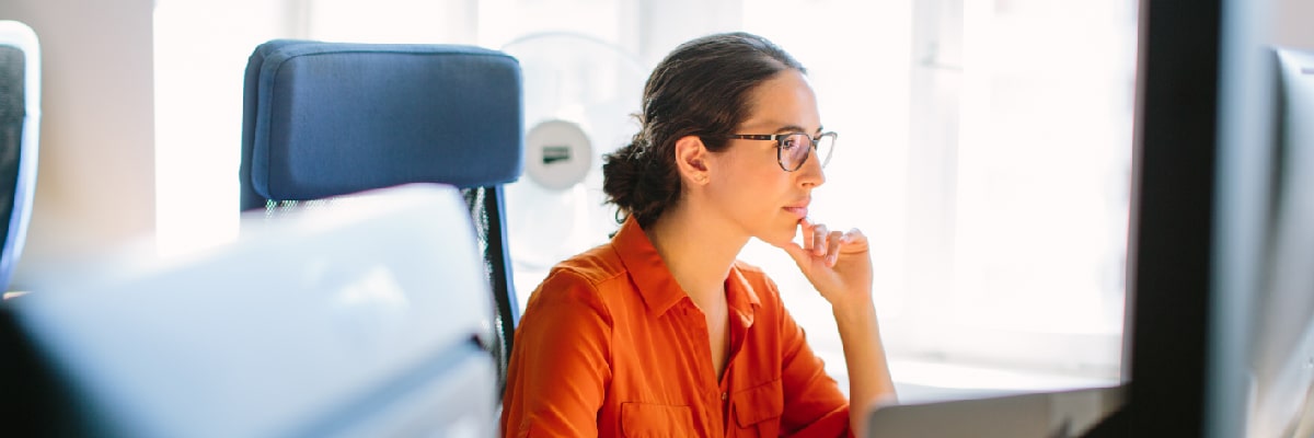 Woman Concentrating on her Computer Screen
