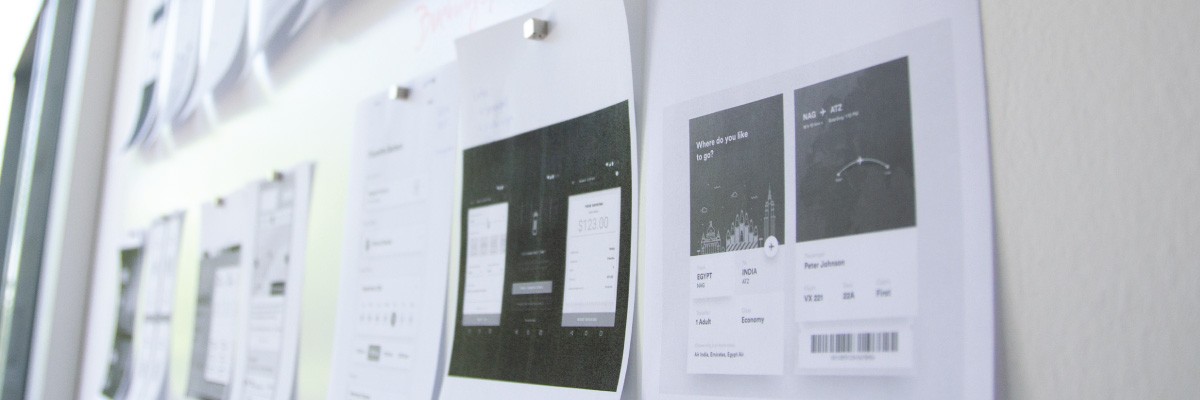 Papers Pinned to a Magnetic White Board