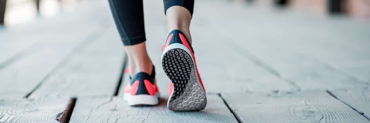 Pair of Feet in Running Shoes