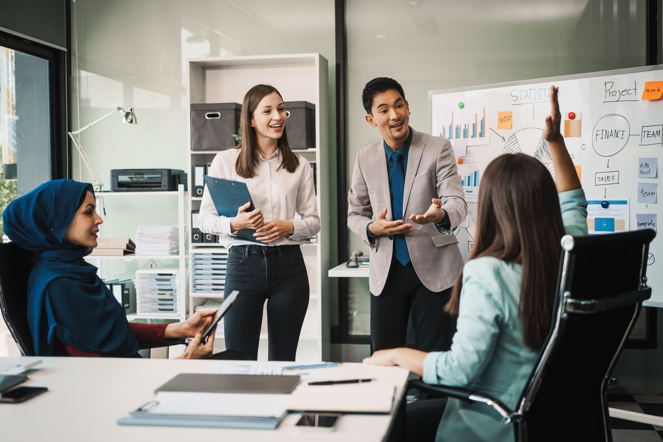 Leaders collaborate on corporate development strategies using AI‑powered tools to forecast skills gaps and design adaptive learning paths
